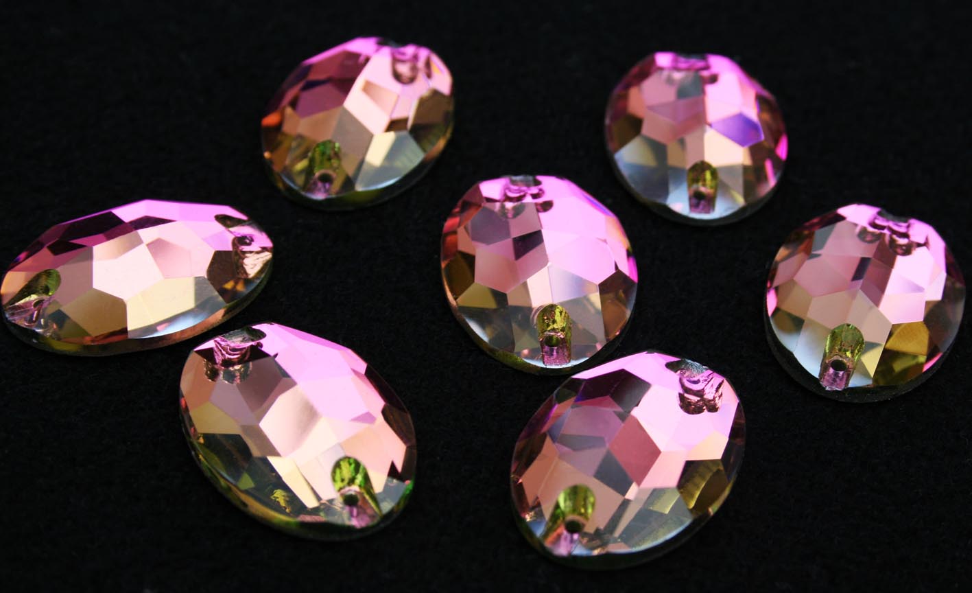 Rose színű ovális alakú kristály