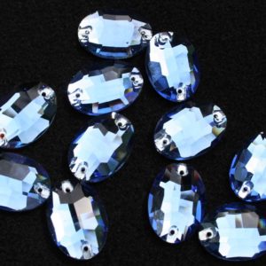 Sapphire színű ovális alakú kristály