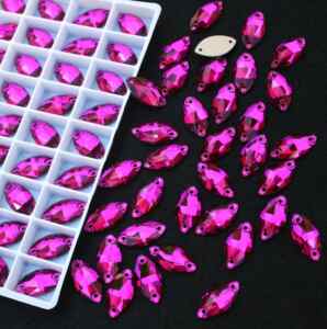 Fuchsia színű zabszem alakú kristály
