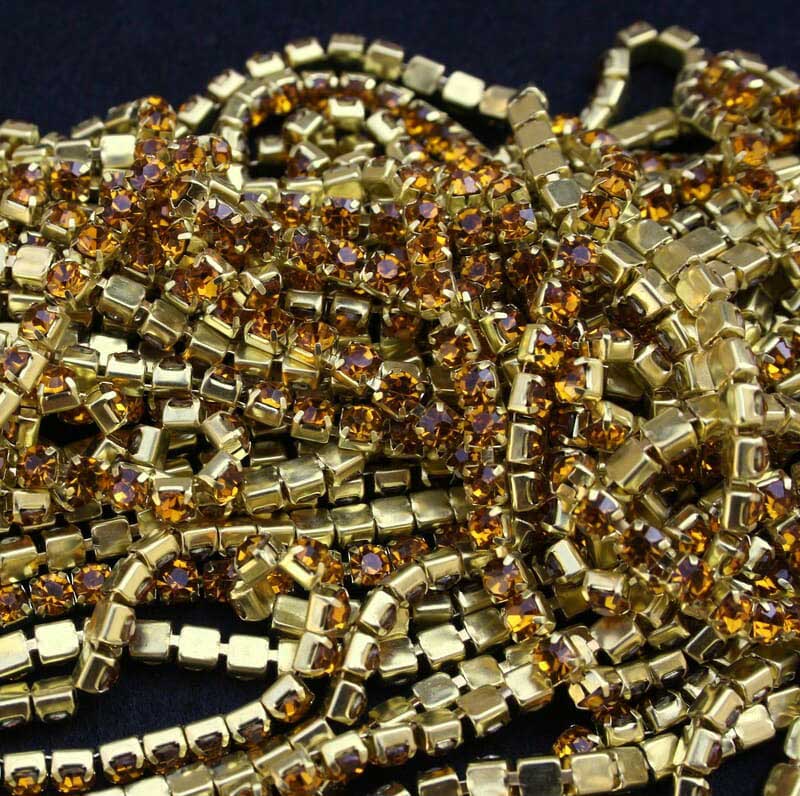 Arany strasszlánc topáz színű kővel