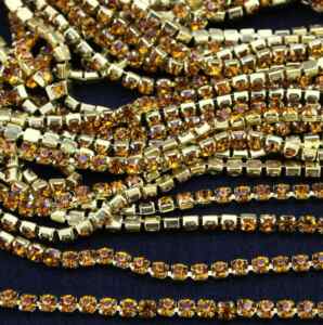 Arany strasszlánc topáz színű kővel